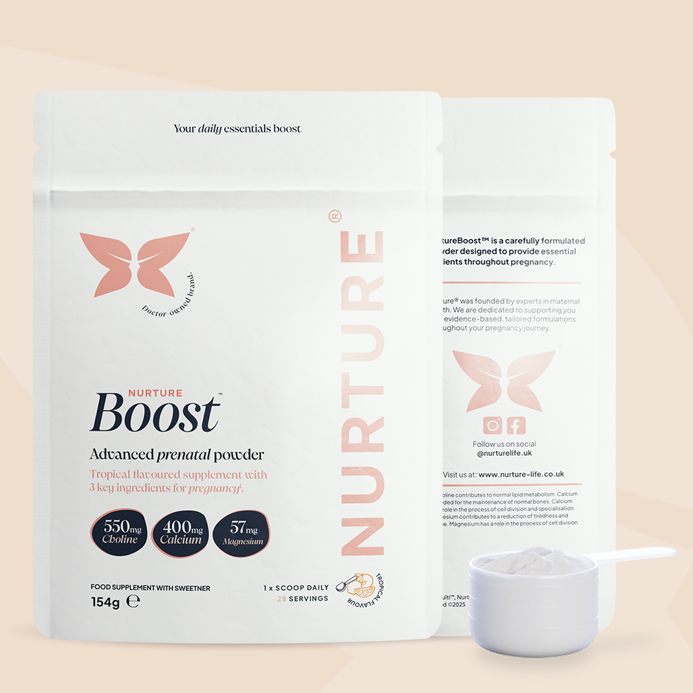 A pouch of NurtureBoost advanced prenatal powder with a measuring scoop in front, branding and information visible on the packaging.