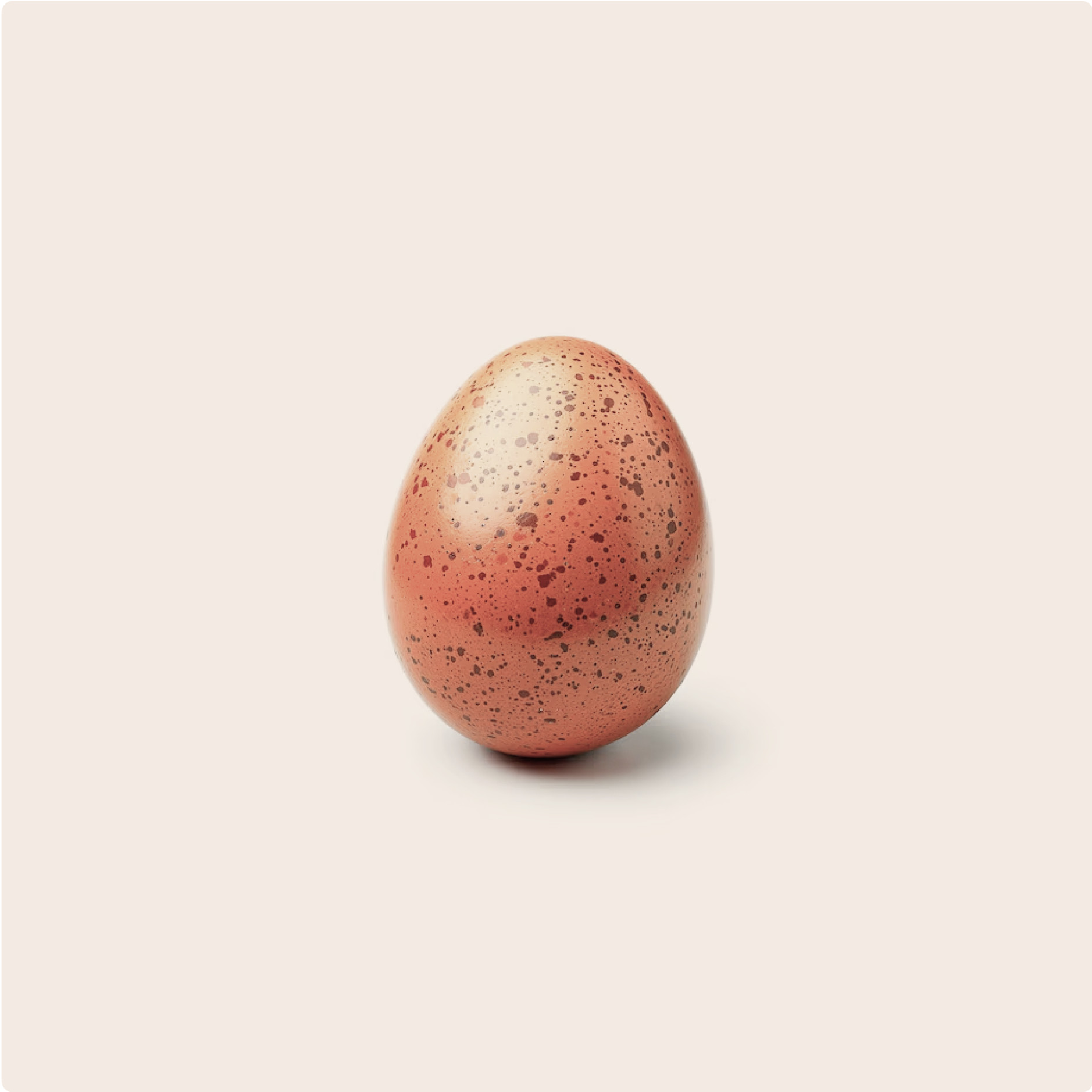Speckled egg on a plain cream background, high in Choline 