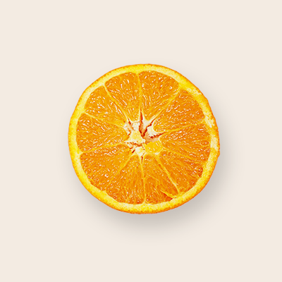 An orange slice on a plain cream background 